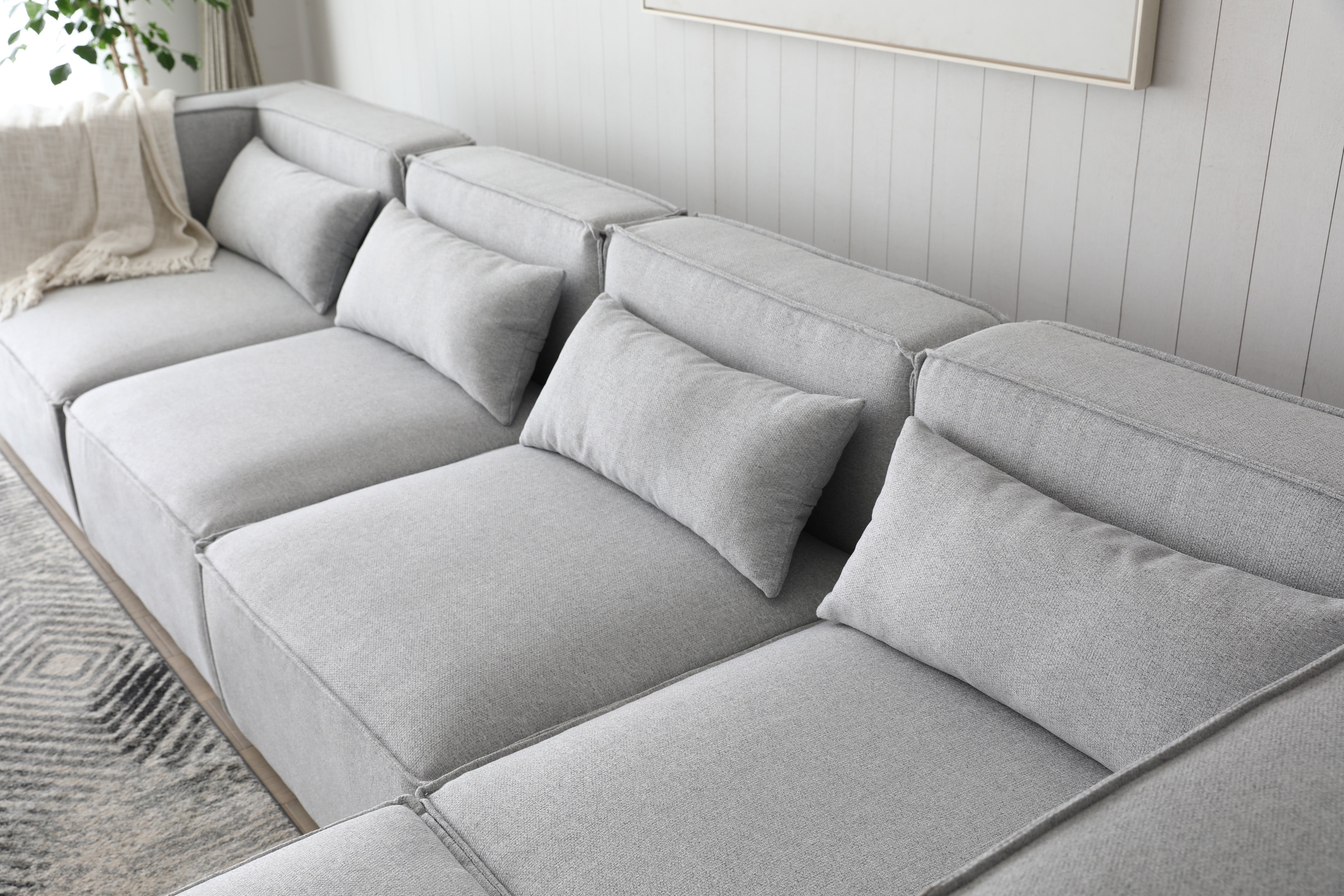 Canapé modulable 4 places + pouf gris